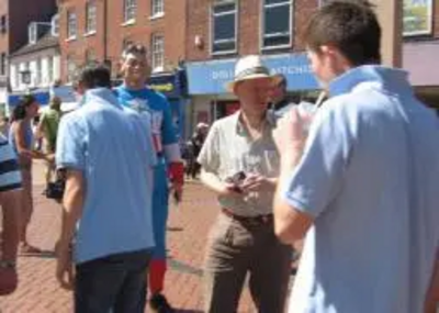 Stephen Robinson hands out Make Trade Fair pledge cards