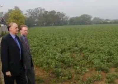 Cllr. Tom Smith-Hughes & Stephen Robinson review a field north of Chelmsford where the Conservatives want to build houses