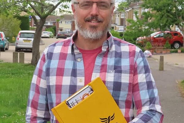 Councillor Richard Lee with a clipboard