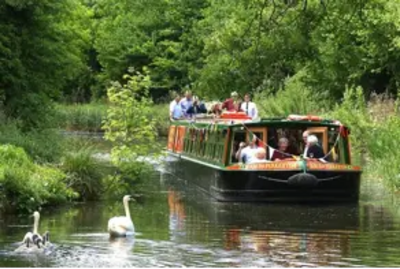 Canal boat cruising on the Basingstoke Canal