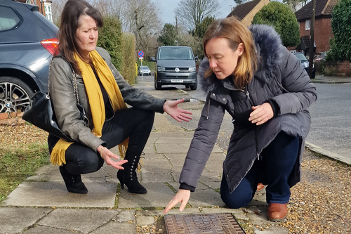 Councillors Hazel Clark and Marie Goldman inspect pavement in Hillside Grove