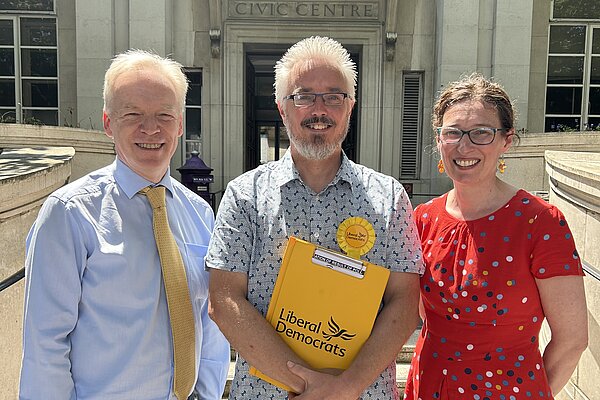 Richard Lee with Stephen Robinson and agent Jennie Lardge outside city hall